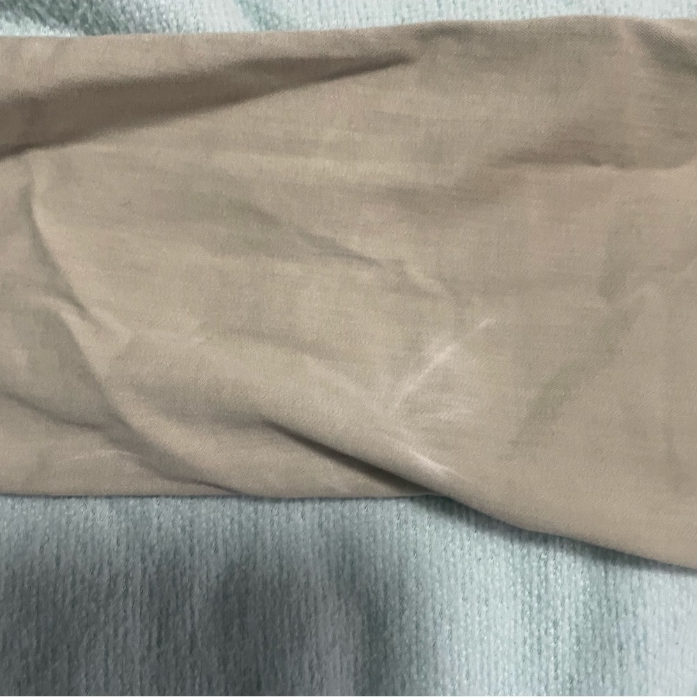 Tan cargo boyfriend jeans, like new small stain in the back of legs. Size 8/29R.